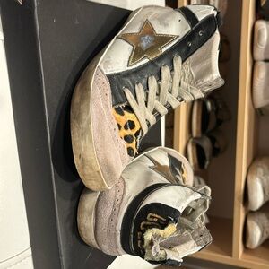 Golden goose size 38 - weathered condition back of one of the shoes torn